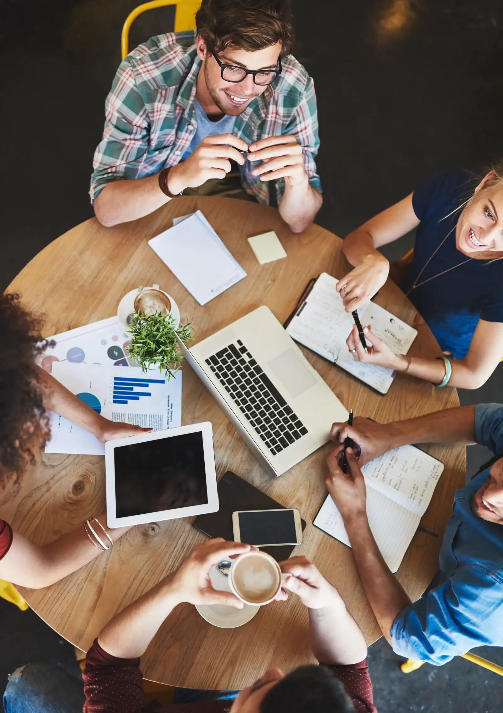 Social media content system connecting planning, creation, and reporting